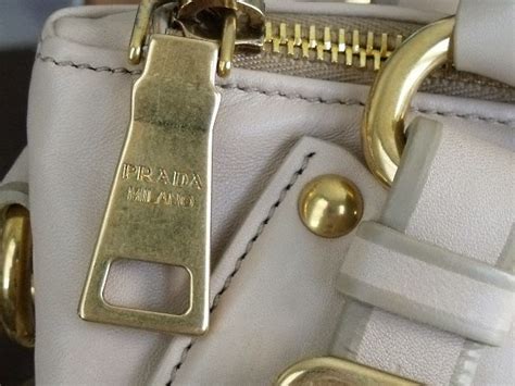 do any real vintage prada bags have on name zippers